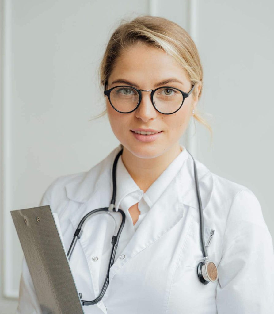 Female doctor holding clipboard