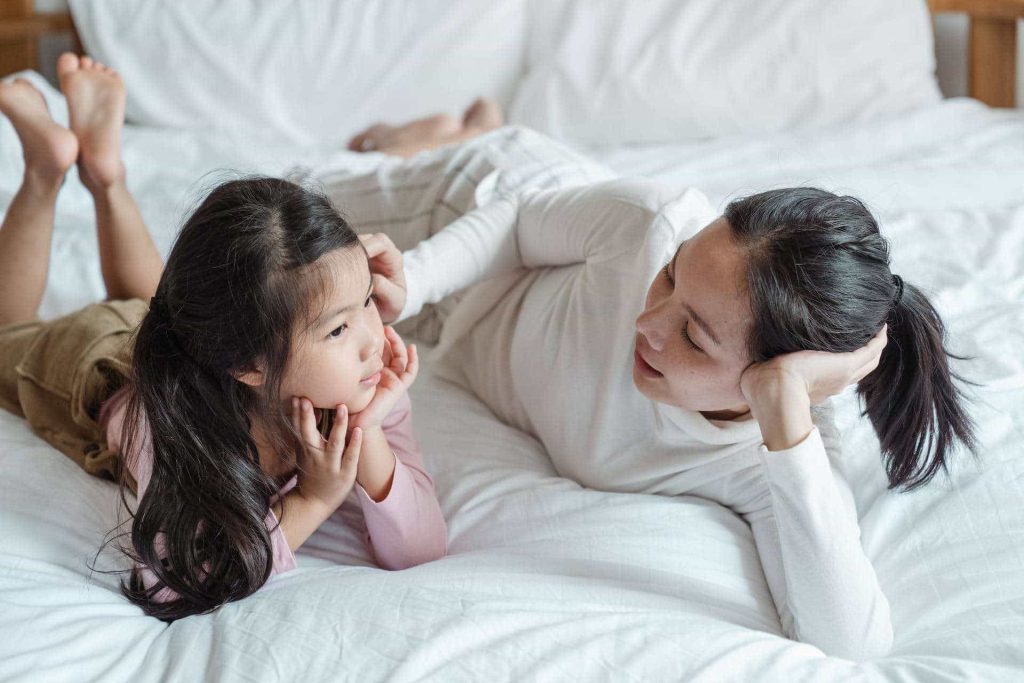 Mom talking to daughter