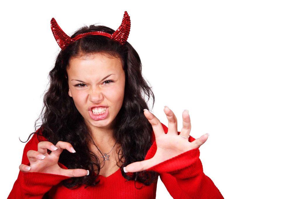 Woman in devil costume