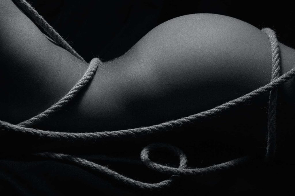 Rope around woman